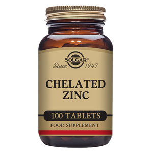 Solgar Chelated Zinc Tablets in a glass bottle with a gold lid