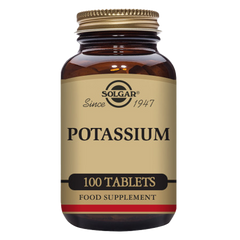 A glass bottle of Solgar Potassium tablets containing 100 tablets, food supplement for maintaining normal blood pressure and muscle function.