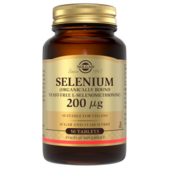 Solgar Selenium tablets in a glass bottle with a gold lid
