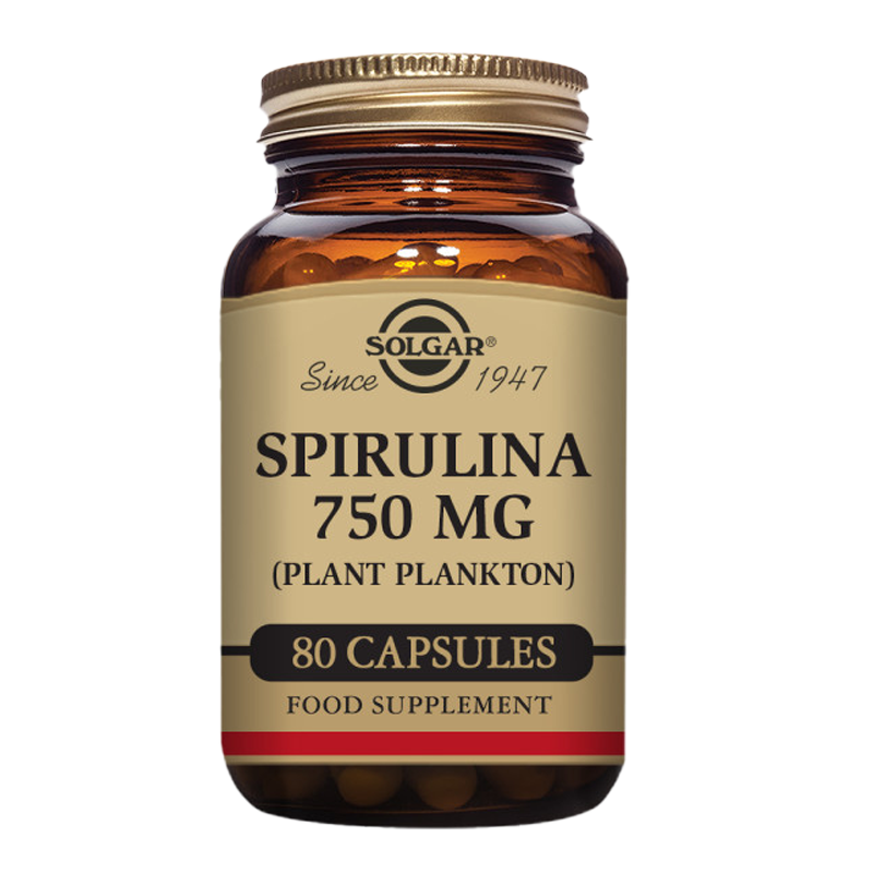 A glass bottle of Solgar Spirulina 750 mg capsules with a gold lid