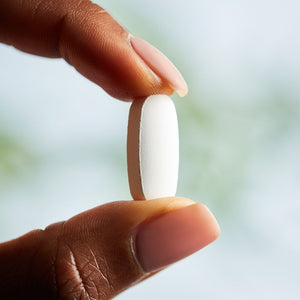 Solgar Calcium Citrate with Vitamin D3 Tablet in a person's hand