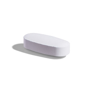 Singular Solgar Calcium Citrate with Vitamin D3 Tablet on a white surface