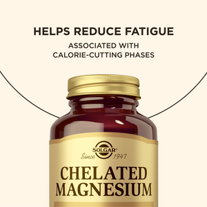 Bottle of Solgar Chelated Magnesium supplements with text about reducing fatigue