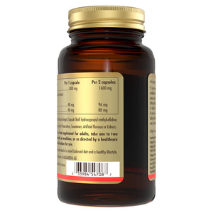 Back view of a Solgar Full Spectrum Curcumin capsule glass bottle containing product information