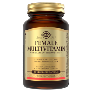 Solgar Female Multivitamin supplements in a glass bottle with a gold lid