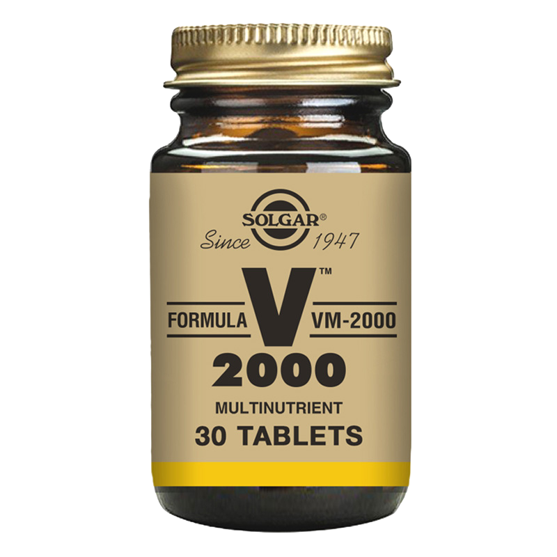 Solgar Formula VM-2000 Multivitamin Tablets in a glass jar with a gold lid