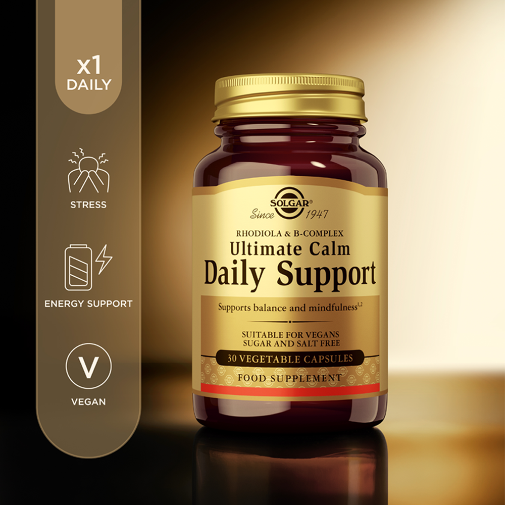 Solgar Ultimate Calm daily support capsules in a glass jar next to some product information