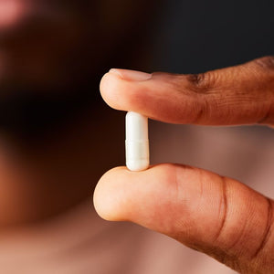 Solgar Vitamin D3 supplement in a person's hand
