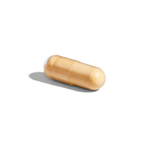 Solgar CoQ-10 30mg capsule on a white surface