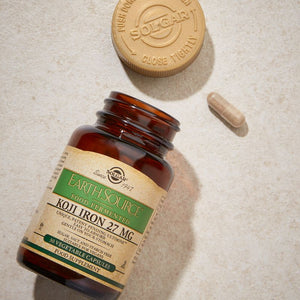 Solgar Earth Source Food Fermented Koji Iron tablets on a table