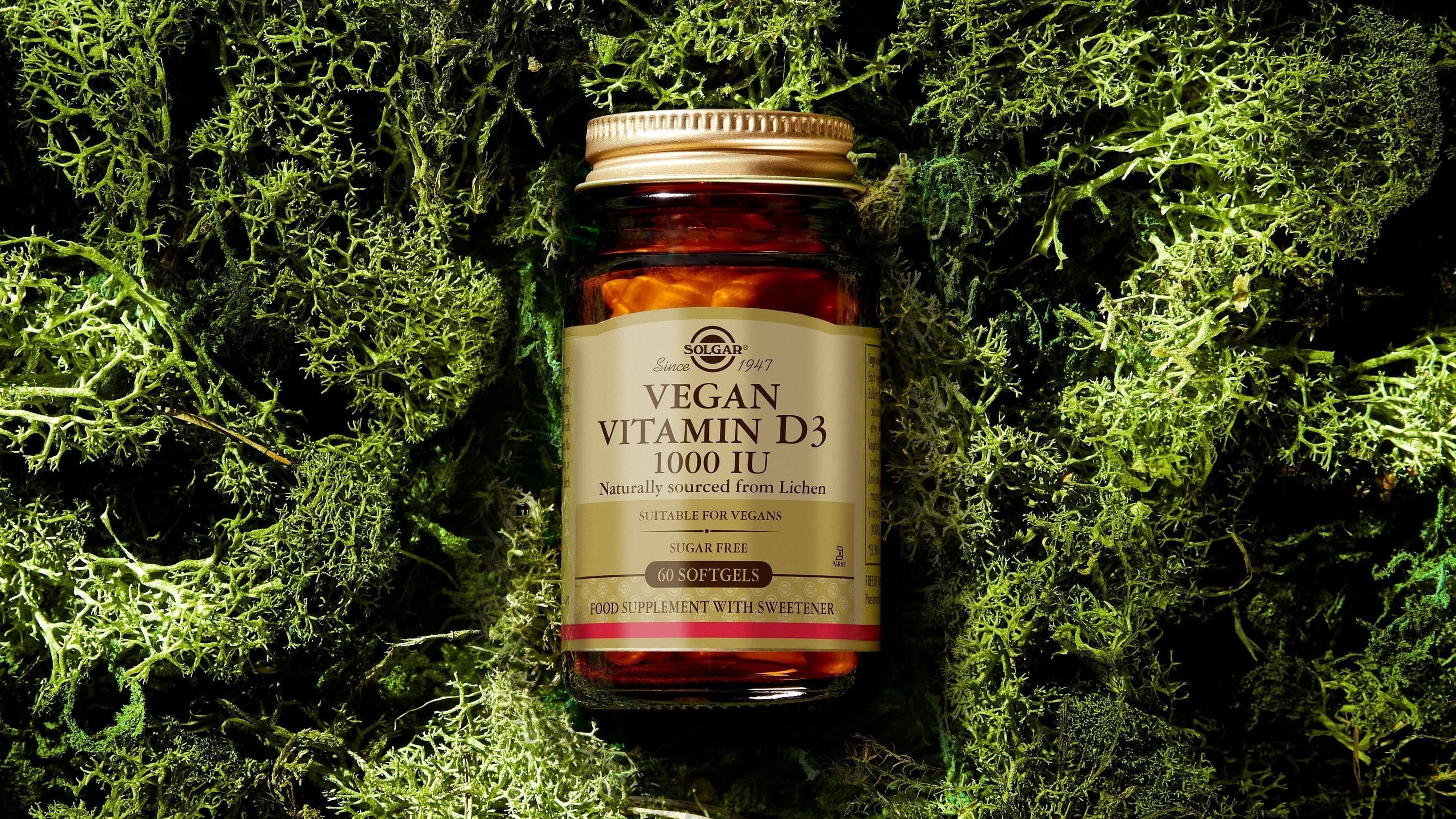 Solgar Vegan Vitamin D3 against a natural grass background 