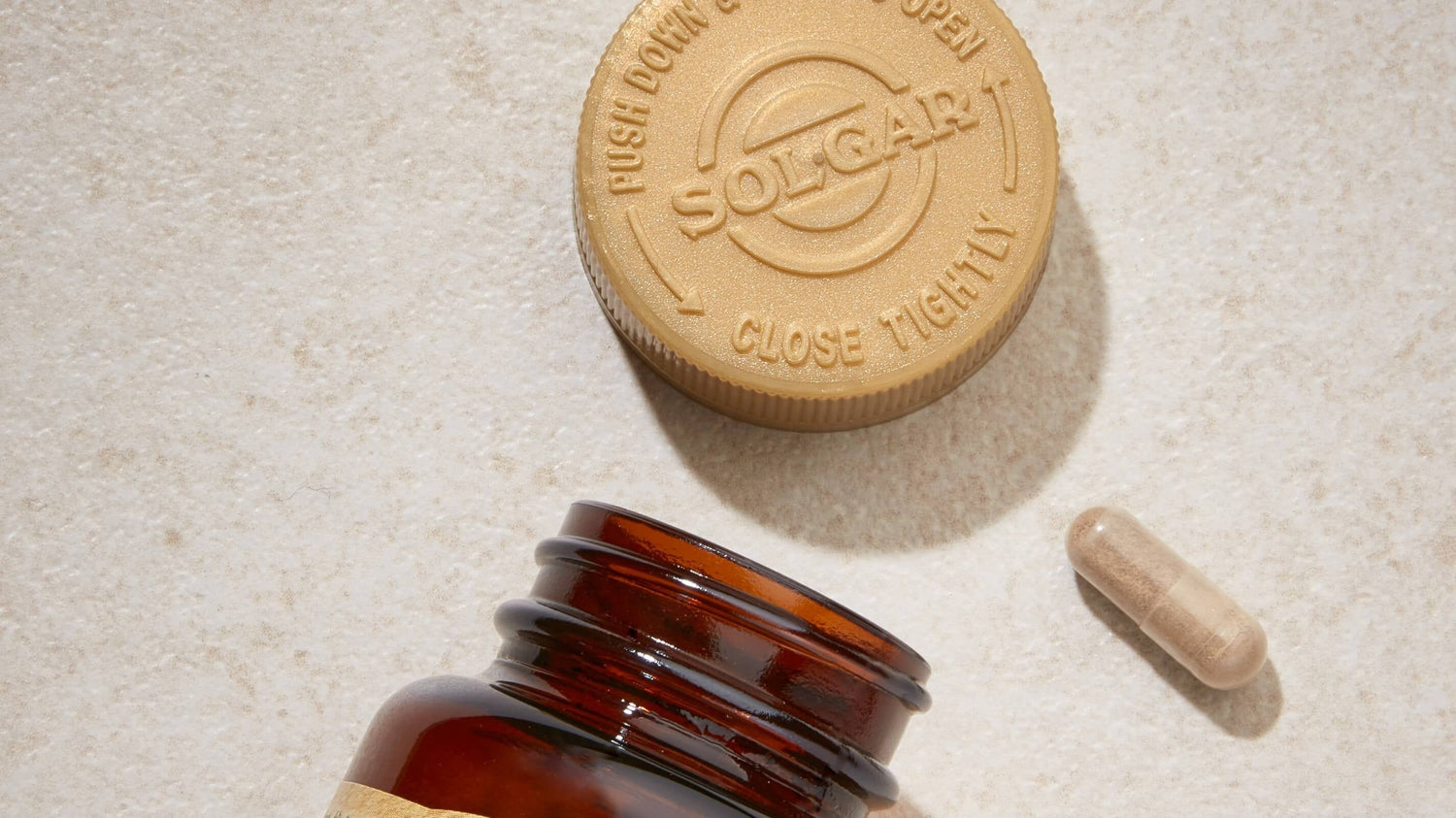 Solgar multi nutrients Vitamins in a glass jar with gold lid