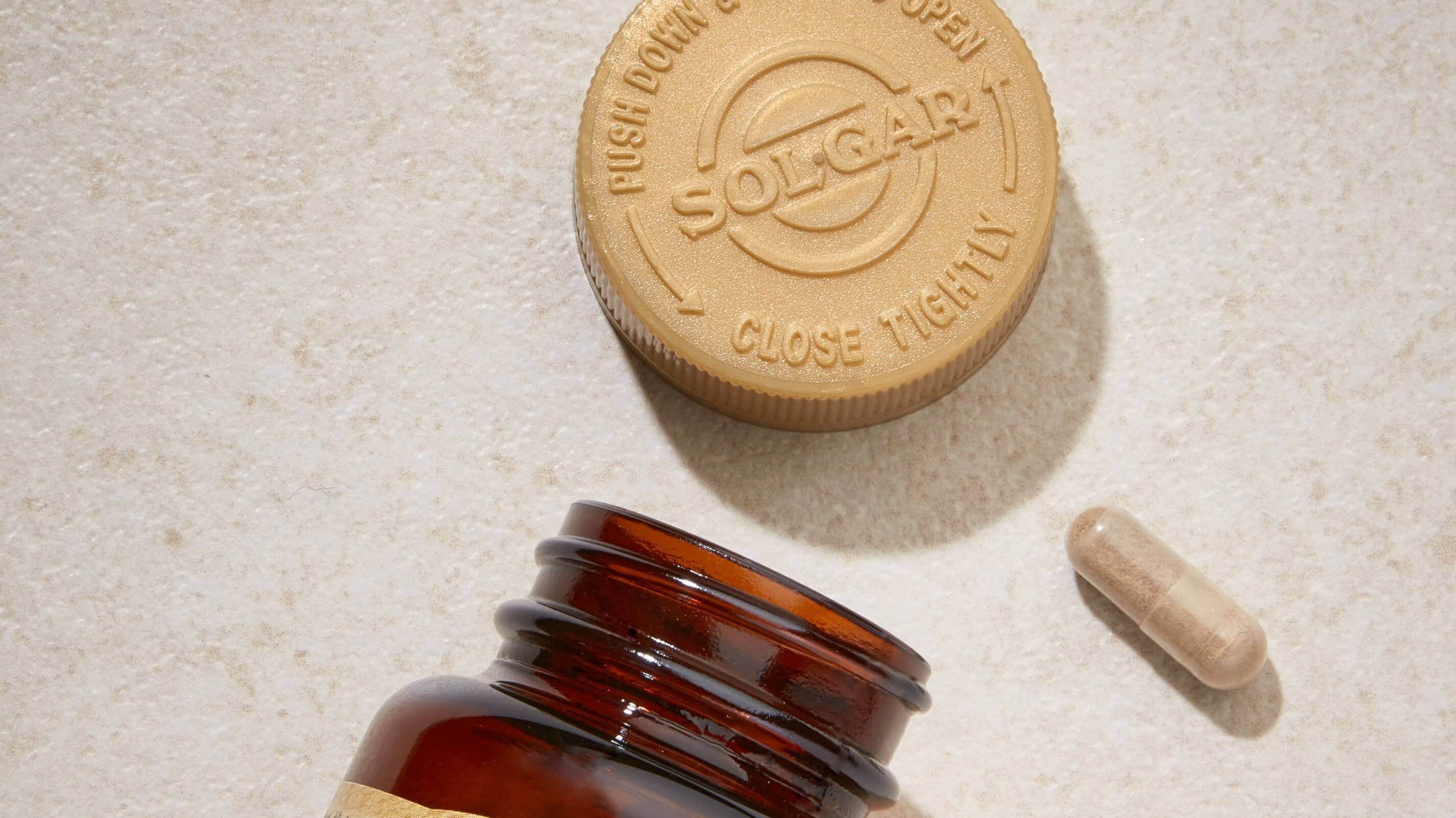 Solgar multi nutrients Vitamins in a glass jar with gold lid