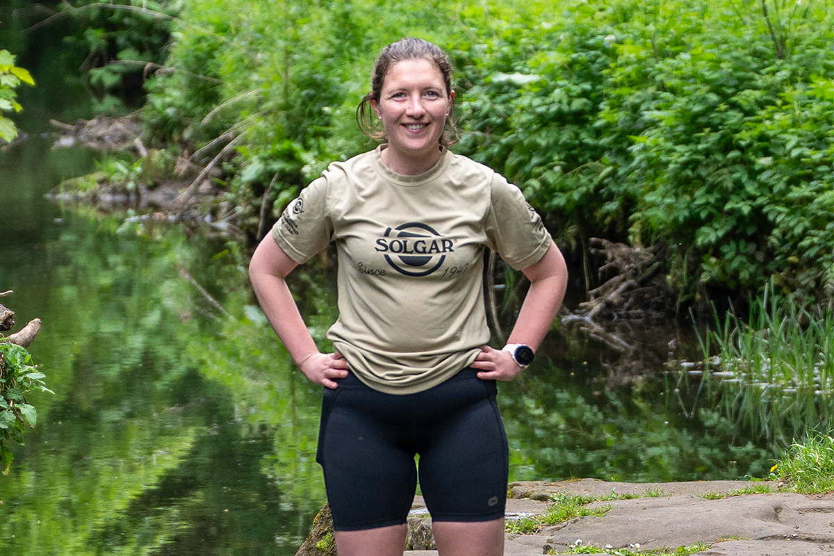 Sophie Reynolds, a Solgar ambassador in a Solgar T shirt running the great North Run