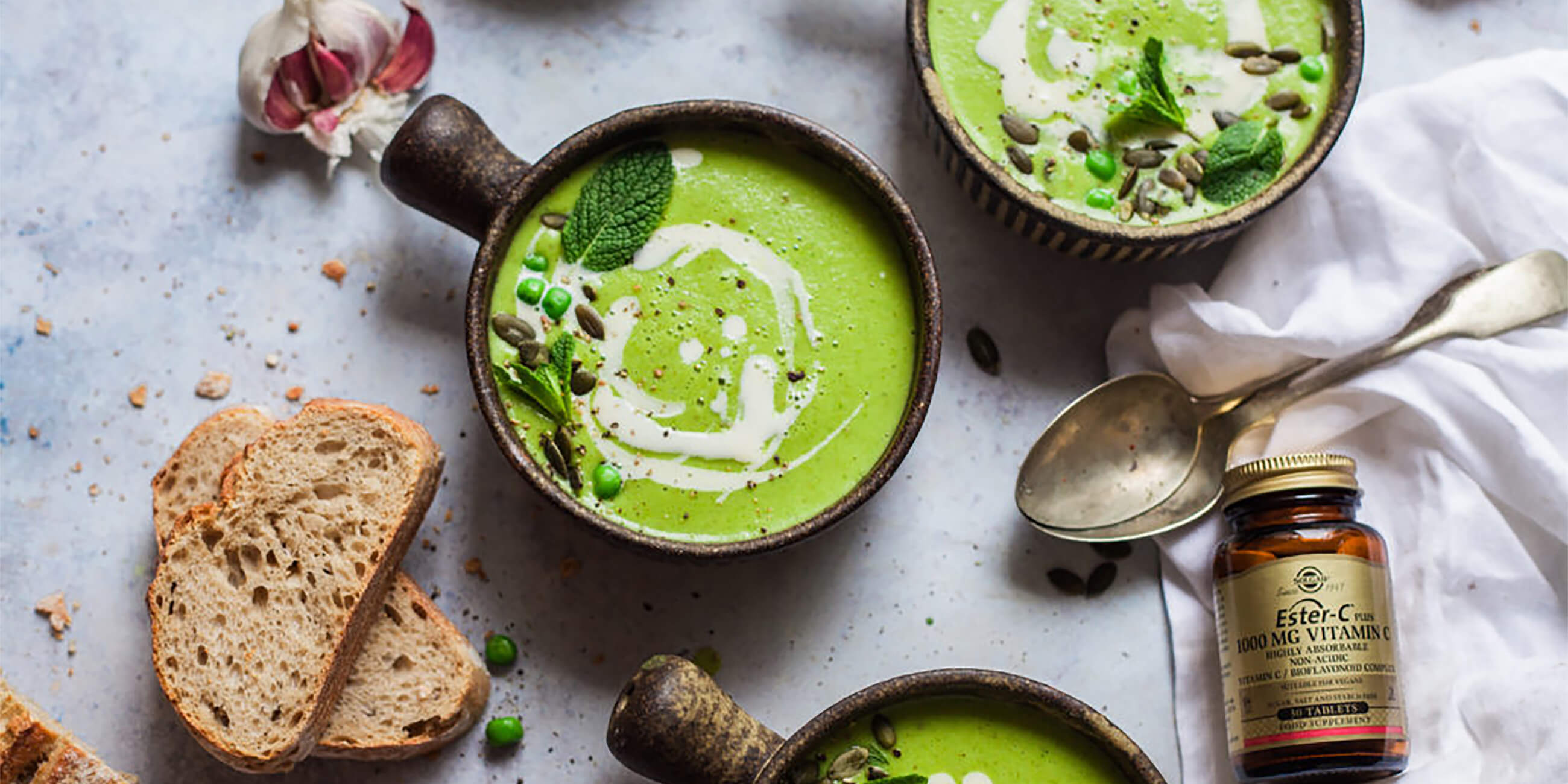 Broccoli and Pea soup next to Solgar Ester-C tablets
