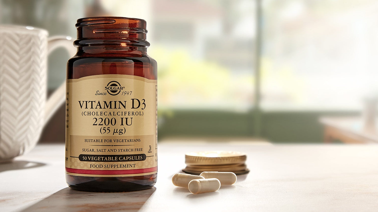 Solgar Vitamin D3 Tablets on a wooden coffee table