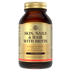 Solgar Skin, Nails & Hair with Biotin supplements in a glass bottle 