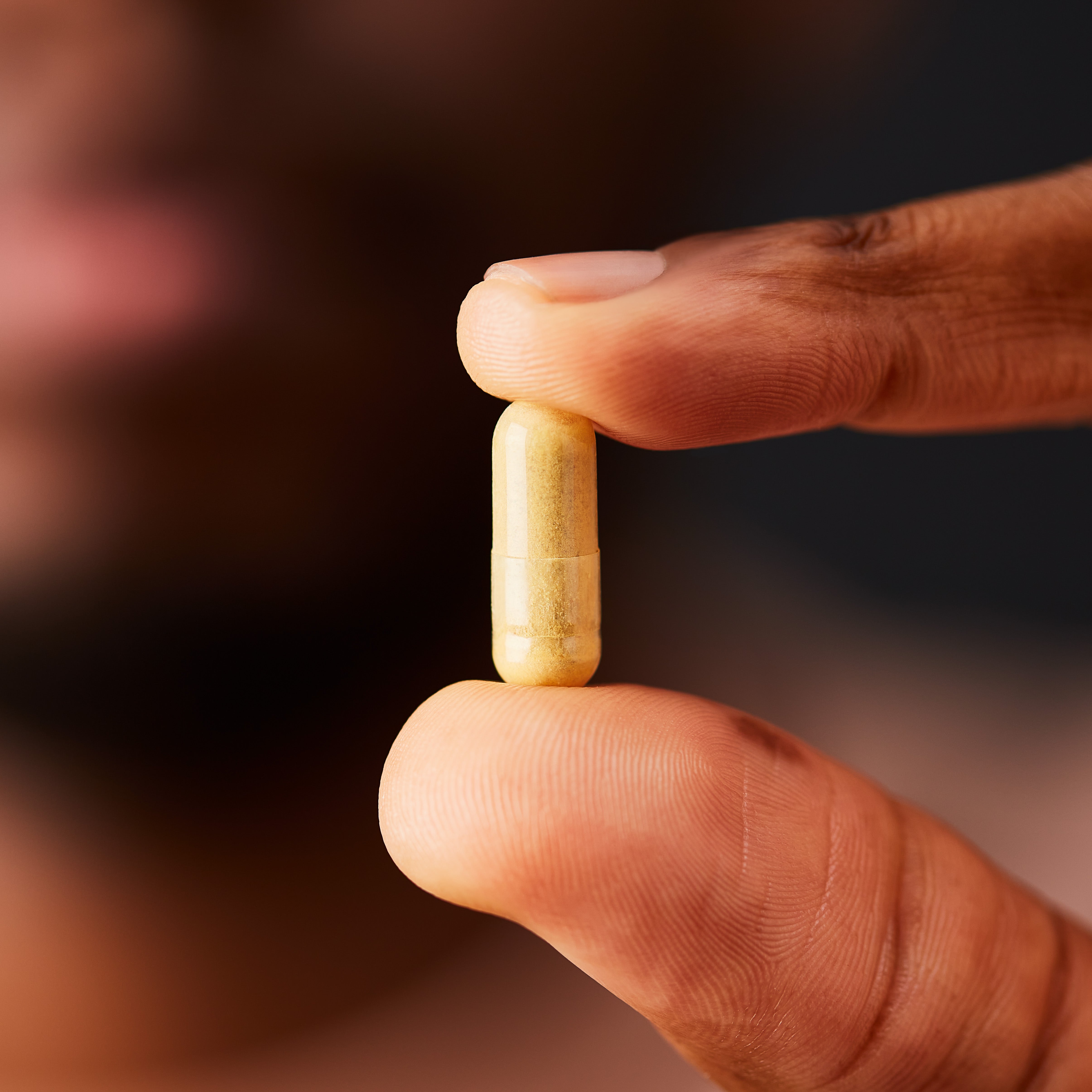 Solgar 7 Joint Support Vegetable Capsule in a person's hand