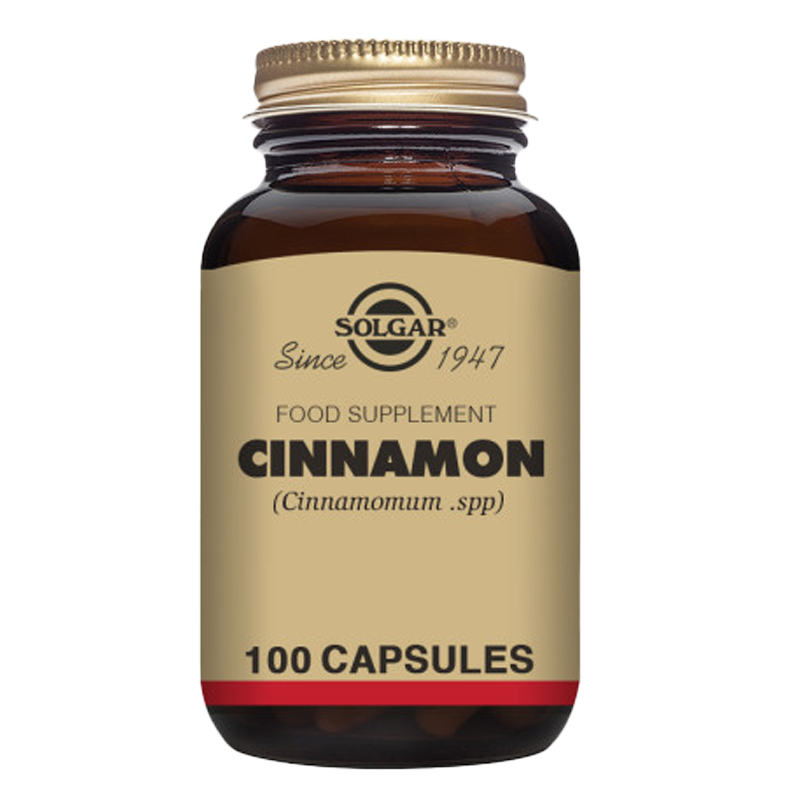 A glass bottle of Solgar cinnamon food supplements with a gold lid