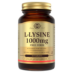 Solgar L-Lysine supplements in a glass jar with a gold lid