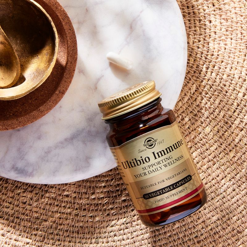 Solgar Ultibio vitamin d3 capsules in a glass jar on a table