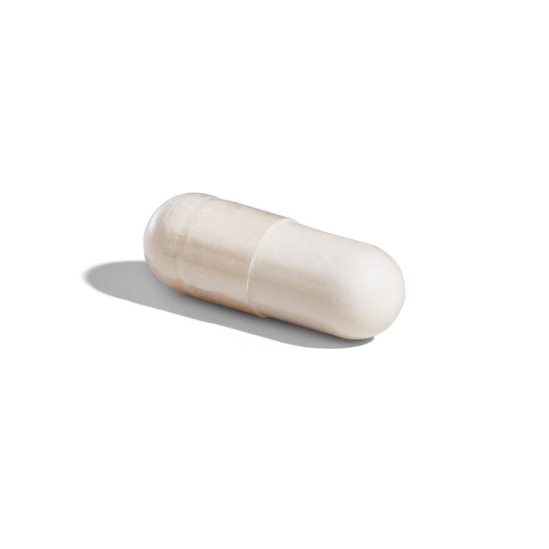 Solgar Vitamin C 500mg capsule on a white surface