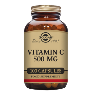 Solgar Vitamin C 500mg capsules in a glass jar with a gold lid