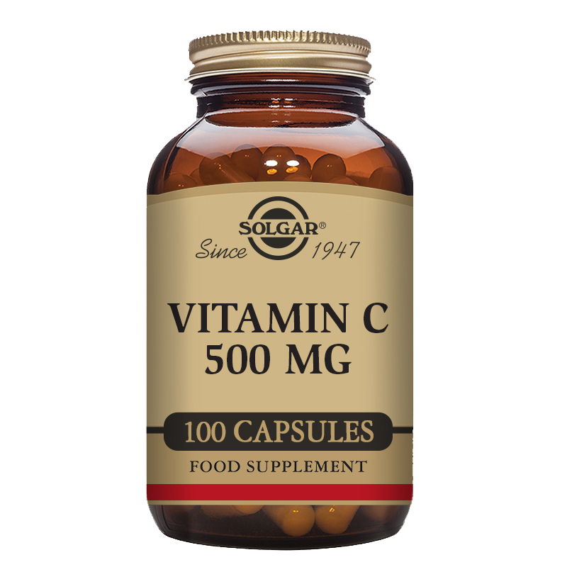 Solgar Vitamin C 500mg capsules in a glass jar with a gold lid