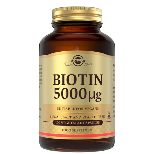 Solgar Biotin supplements glass bottle with a gold lid
