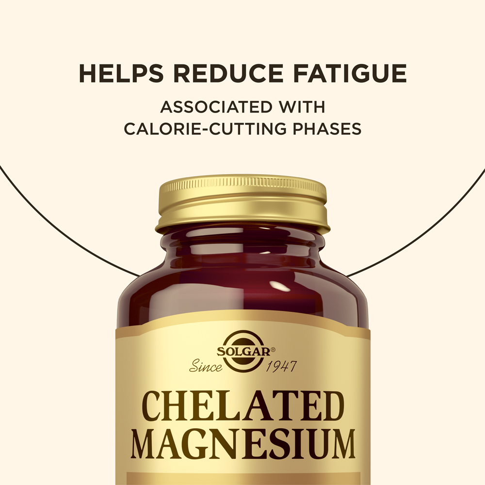 Bottle of Solgar Chelated Magnesium supplements with text about reducing fatigue