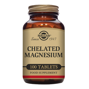 Solgar Chelated Magnesium supplements in a glass jar with a gold lid