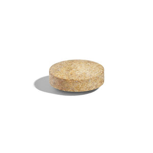 Singular Solgar Digestive Enzymes Tablet on a white surface