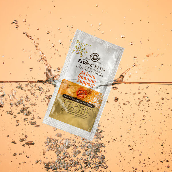 Solgar Ester C-Plus powder sachet packet floating on water 