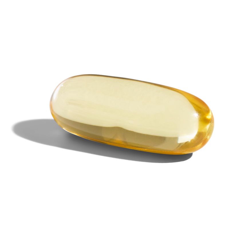 Solgar Fish Gel Omega-3 740 mg Softgel on a table 