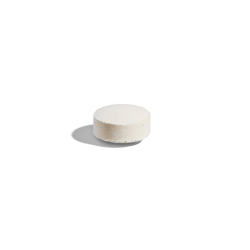 Solgar Folacin (folic acid) tablet on a white surface