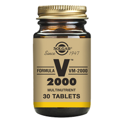 Solgar Formula VM-2000 Multivitamin Tablets in a glass jar with a gold lid