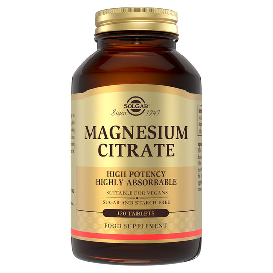 Solgar Magnesium Citrate supplements in a glass bottle with a gold lid
