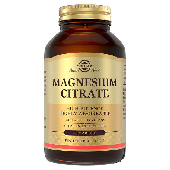 Solgar Magnesium Citrate supplements in a glass bottle with a gold lid