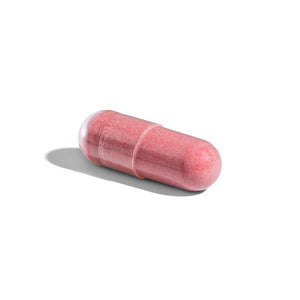 Singular Solgar Natural Cranberry with Vitamin C vegetable capsule on a white surface