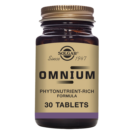 Solgar Omnium Multivitamin Tablets in a glass bottle with a gold lid