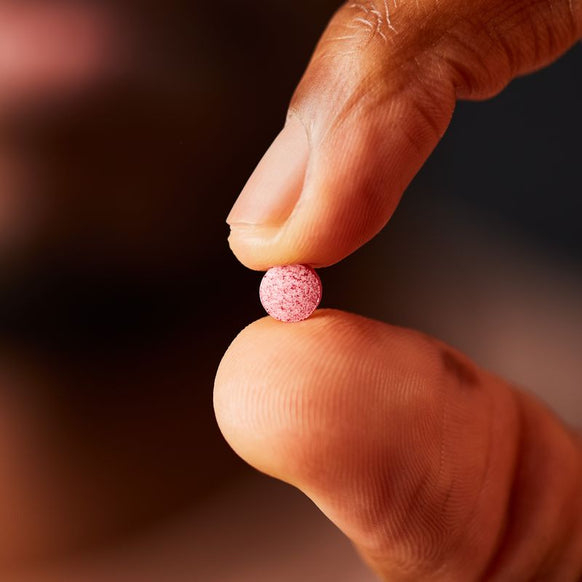 Solgar Vitamin B12 supplement in a person's hand