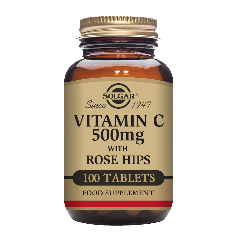 A glass bottle of Solgar Vitamin C 500mg with Rose Hips tablets with a gold lid