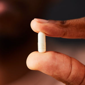 Solgar Vitamin D3 supplement in a person's hand