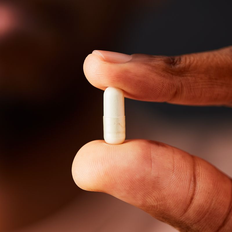 Solgar Vitamin D3 supplement in a person's hand
