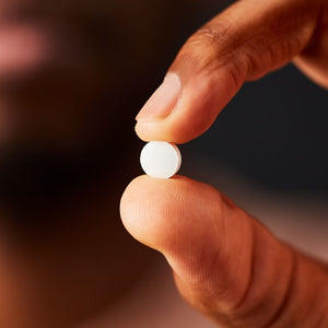 Solgar Zinc Picolinate capsule in a person's hand