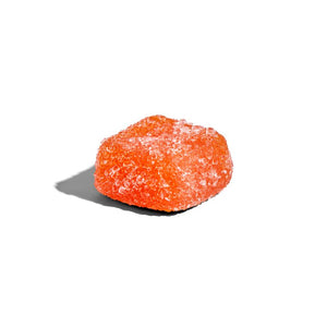 One loose orange flavoured Solgar U-Cubes Children's Multi-Vitamin and Mineral Gummy