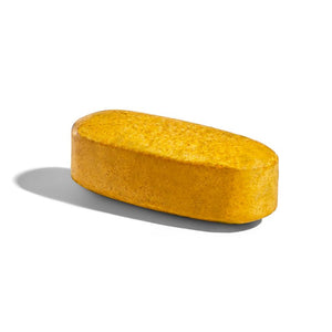 Singular Solgar Formula VM-2000 Multivitamin Tablet on a white surface