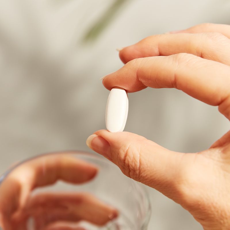 Solgar Lipotropic Factors Tablet in a person's hand